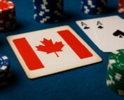 Canadian flag playing card with poker chips representing Ontario joining North American online poker network