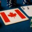 Canadian flag playing card with poker chips representing Ontario joining North American online poker network