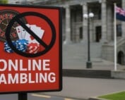 New Zealand online gambling prohibition sign with New Zealand flag representing Department of Internal Affairs order against 20Bet illegal advertising