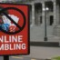 New Zealand online gambling prohibition sign with New Zealand flag representing Department of Internal Affairs order against 20Bet illegal advertising
