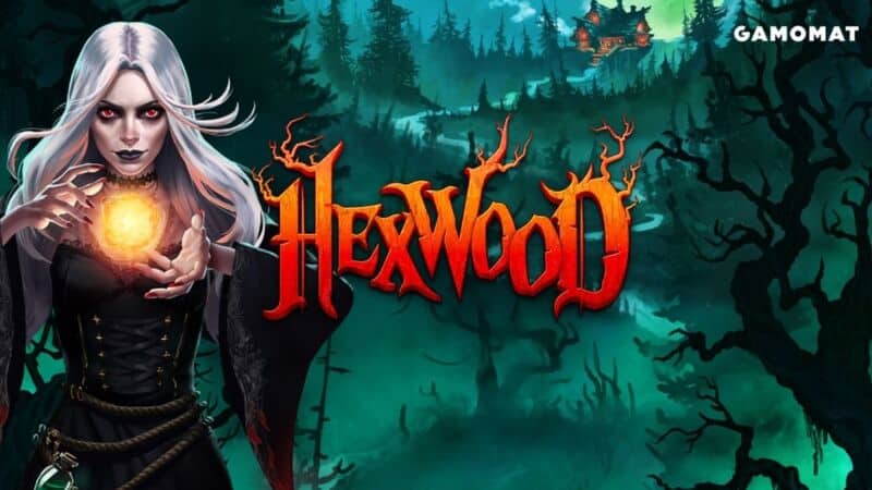 Titelbild des neuen Gamomat Hexwood Slot zeigt mystische Hexe im dunklen Wald.
