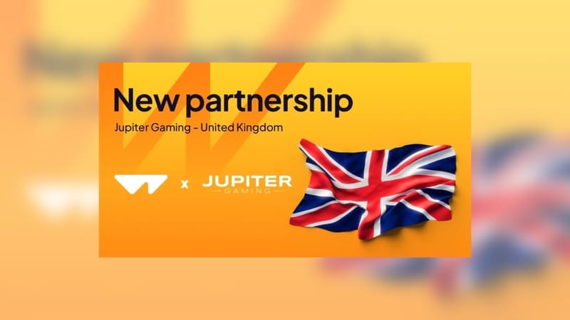 Ank&uuml;ndigung der Partnerschaft zwischen Wazdan und Jupiter Gaming mit Gro&szlig;britannienflagge.