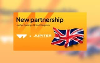 Ankündigung der Partnerschaft zwischen Wazdan und Jupiter Gaming mit Großbritannienflagge.